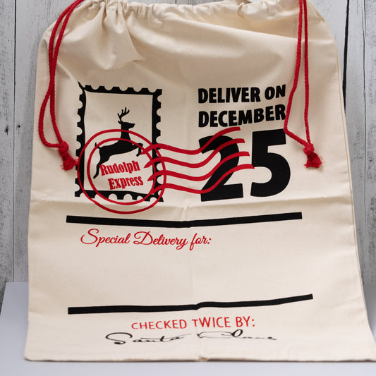 Christmas Gift Bags | Reusable Oversized Fabric with Drawstring Cord - Deliver on December 25 Logo